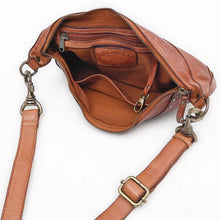 Load image into Gallery viewer, Comet sling bag open, showing lined interior, zip pocket, slip pocket and key clip

