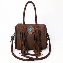 Load image into Gallery viewer, Reata leather barrel satchel in Chocolate, front view with turquoise stone concho, braided handles, and long fringe
