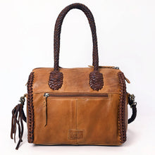 Load image into Gallery viewer, Back view of the Reata leather barrel satchel in Honey Tan with exterior zip pocket and braided handle anchors
