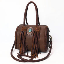 Load image into Gallery viewer, Reata turquoise braided fringe leather barrel satchel in Chocolate, angled front view with two-tone fringe tassels and braided crossbody strap
