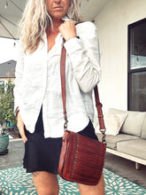 Load image into Gallery viewer, Model carrying the Washoe Lake studded Italian leather crossbody purse
