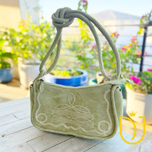 Load image into Gallery viewer, Emilie sage green suede purse, alternate view of the boot stitch shoulder and crossbody bag

