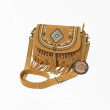 Load image into Gallery viewer, Lodestar tan suede crossbody with southwestern diamond embroidery, brass concho, tassel and fringe, three-quarter view
