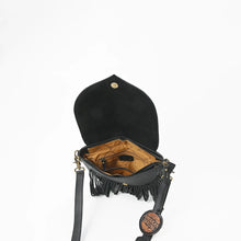Load image into Gallery viewer, Raven crossbody bag open, showing the suede flap underside, magnetic snap, and zip-top interior
