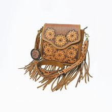 Load image into Gallery viewer, Solana hand-tooled leather crossbody with six carved sunflowers, tooled strap and long leather fringe, three-quarter view
