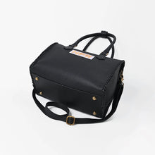 Load image into Gallery viewer, Dennison black leather NFR speedy bag with hand-braided detailing and Wrangler Las Vegas 2026 charm
