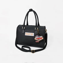 Load image into Gallery viewer, Dennison black leather NFR speedy bag with hand-braided detailing and Wrangler Las Vegas 2026 charm
