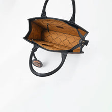 Load image into Gallery viewer, Inside the Liberty embroidered leather tote, zip-top opening with a lined interior, zip pocket, and slip pockets, with rolled black leather handles
