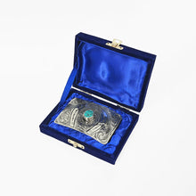 Load image into Gallery viewer, Close-up of hand-engraved scrollwork and antique silver finish on Quinn turquoise horseshoe belt buckle

